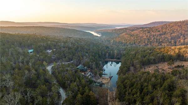 171 Acres of Recreational Land with Home for Sale in Galena, Missouri