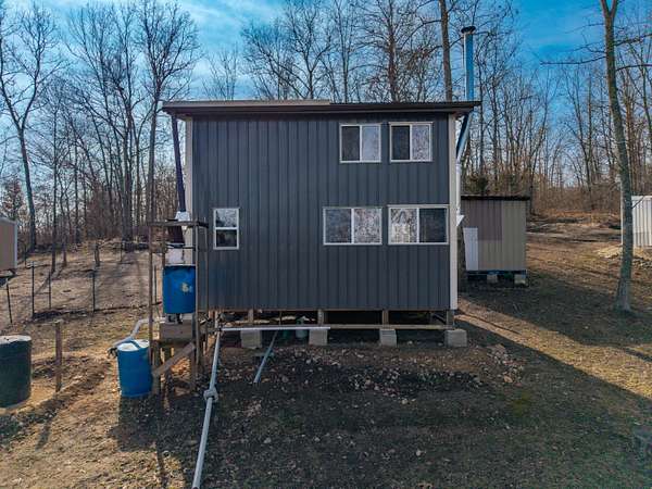 10.3 Acres of Recreational Land with Home for Sale in Ava, Missouri