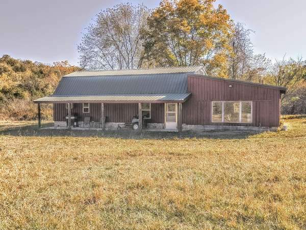 47 Acres of Recreational Land with Home for Sale in Gainesville, Missouri