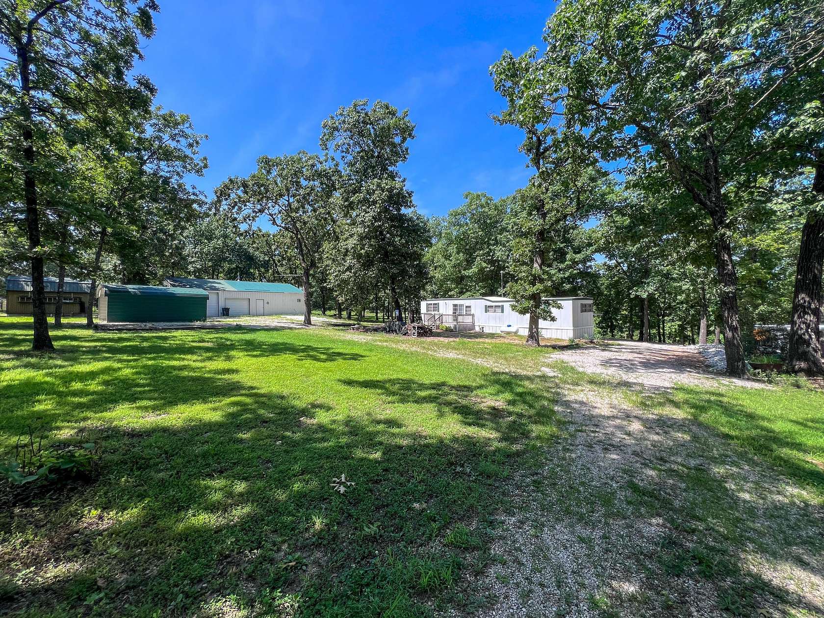 3.28 Acres of Land with Home for Sale in Pittsburg, Missouri