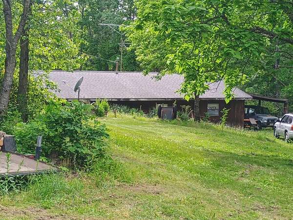 9.28 Acres of Land with Home for Sale in Licking, Missouri