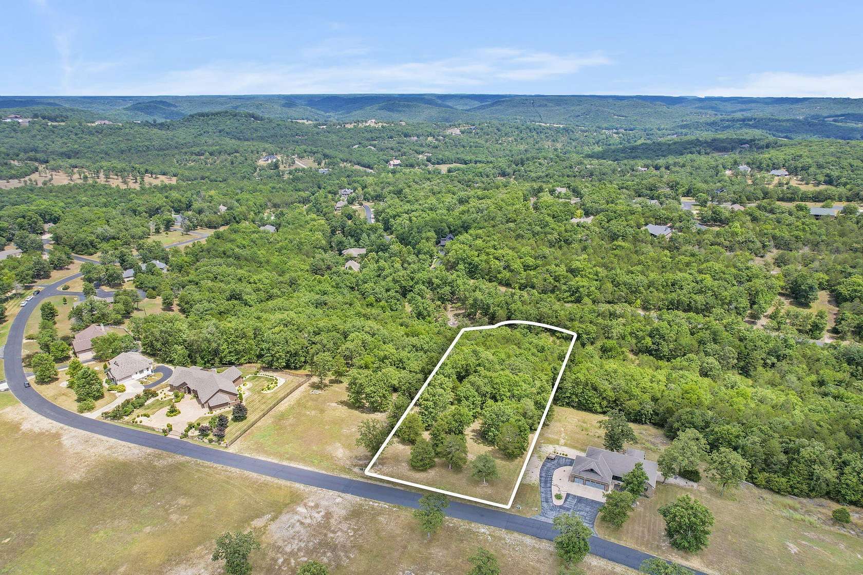 2.32 Acres of Residential Land for Sale in Saddlebrooke, Missouri