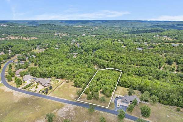 2.32 Acres of Residential Land for Sale in Saddlebrooke, Missouri