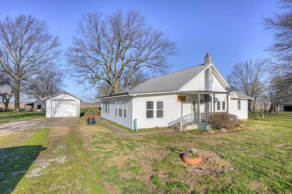 4.42 Acres of Land with Home for Sale in Golden City, Missouri