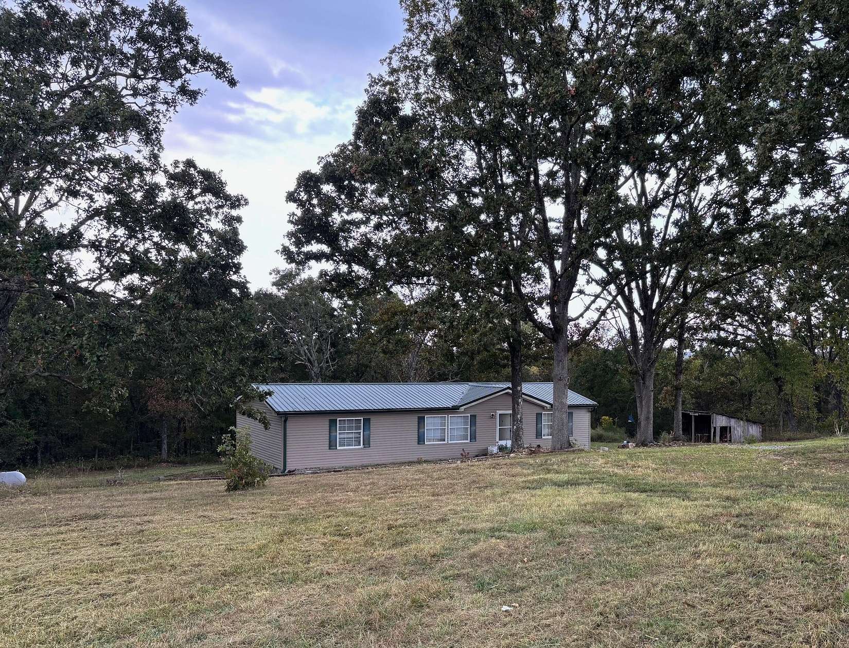11.5 Acres of Recreational Land with Home for Sale in Elk Creek, Missouri