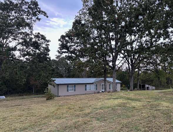 11.5 Acres of Recreational Land with Home for Sale in Elk Creek, Missouri