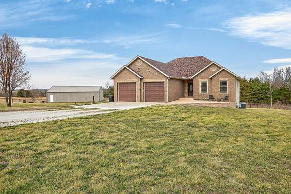 14.7 Acres of Land with Home for Sale in Marshfield, Missouri