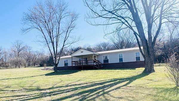 2.8 Acres of Land with Home for Sale in Seligman, Missouri