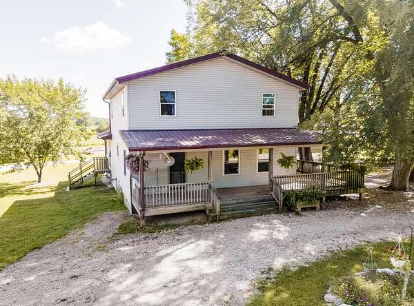 7.9 Acres of Land with Home for Sale in Rocky Comfort, Missouri