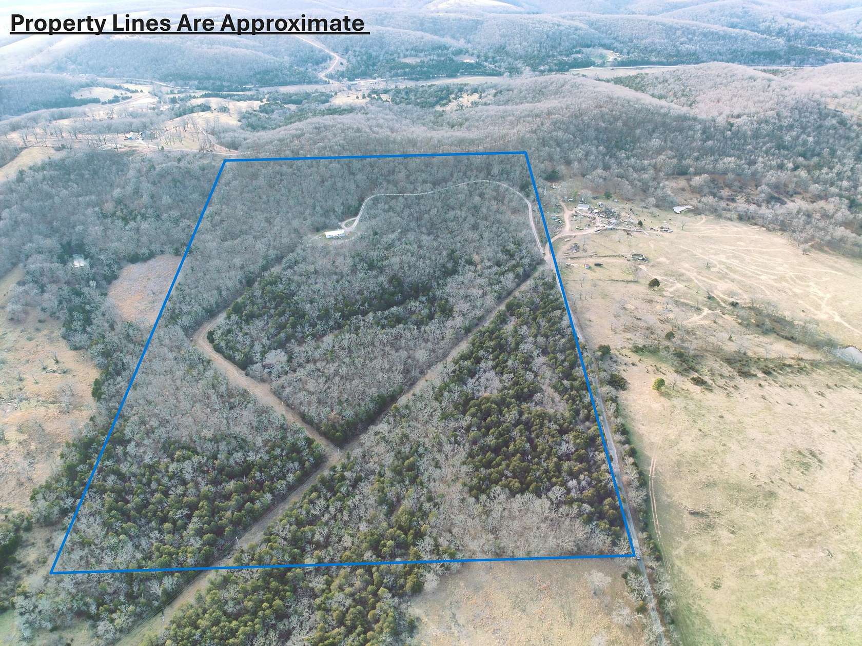 60 Acres of Recreational Land with Home for Sale in Aurora, Missouri