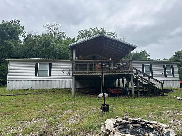 60 Acres of Recreational Land with Home for Sale in Aurora, Missouri