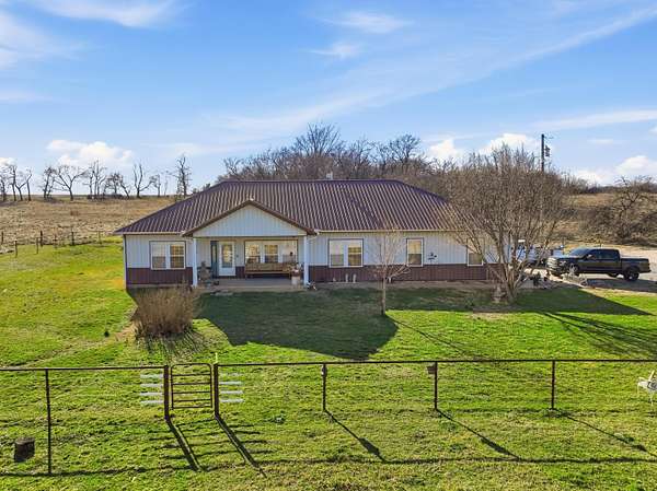 1.74 Acres of Land with Home for Sale in Carthage, Missouri