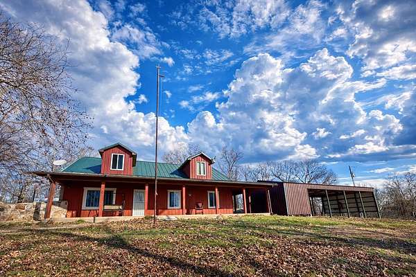 32.8 Acres of Land with Home for Sale in Alton, Missouri