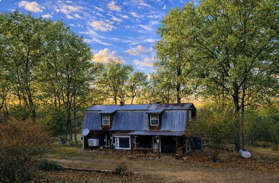 71.7 Acres of Land with Home for Sale in Alton, Missouri