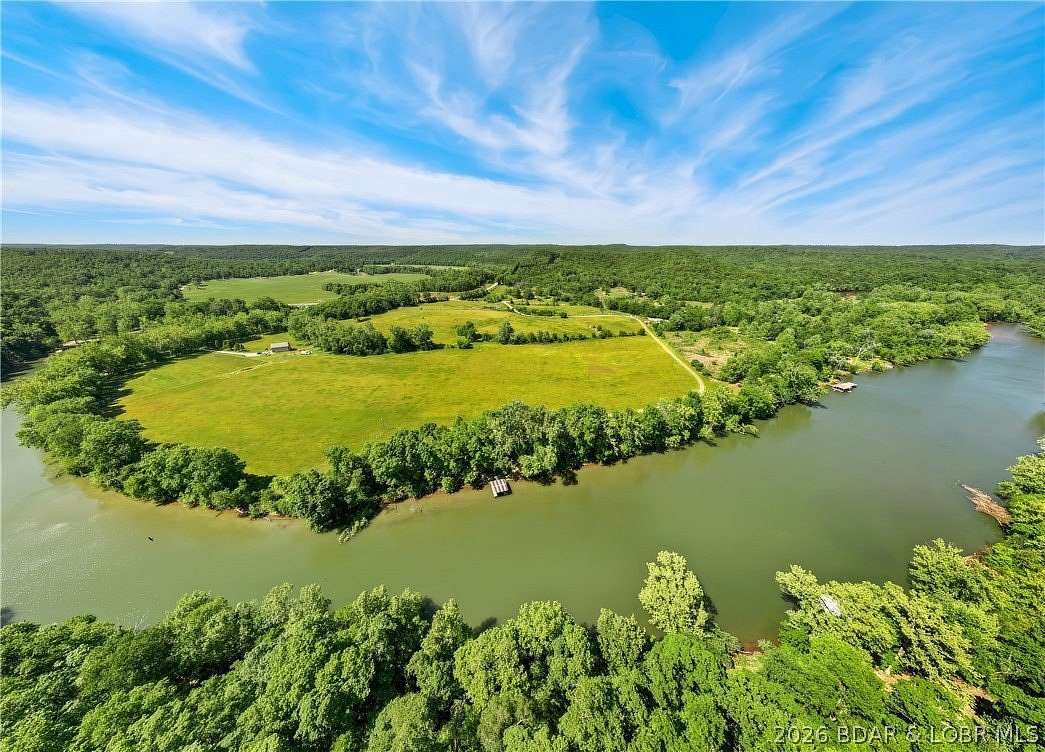 11.5 Acres of Recreational Land with Home for Sale in Roach, Missouri