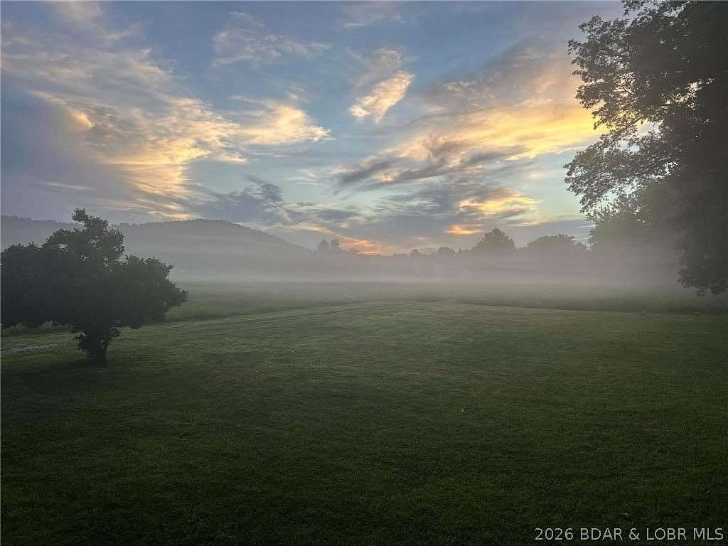 17.6 Acres of Recreational Land with Home for Sale in Roach, Missouri