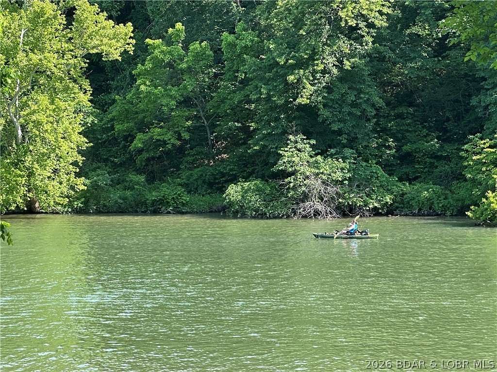 11.5 Acres of Recreational Land with Home for Sale in Roach, Missouri
