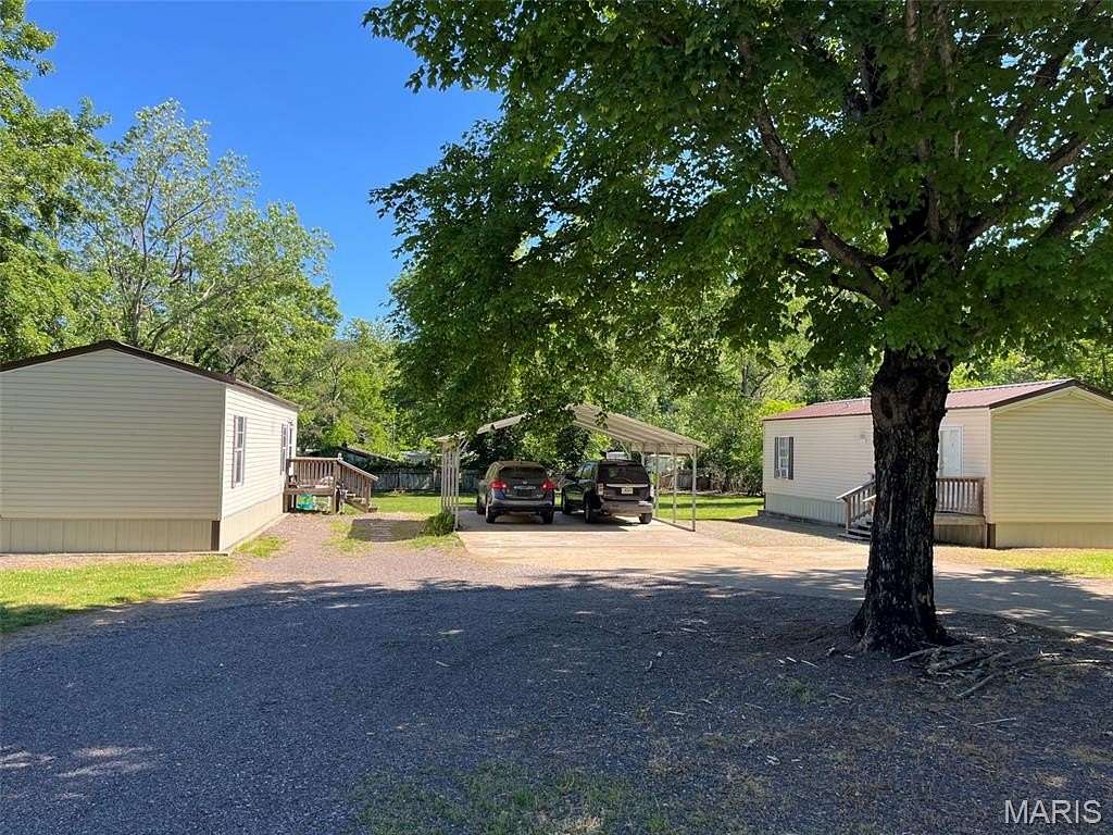 0.68 Acres of Land with Home for Sale in Piedmont, Missouri