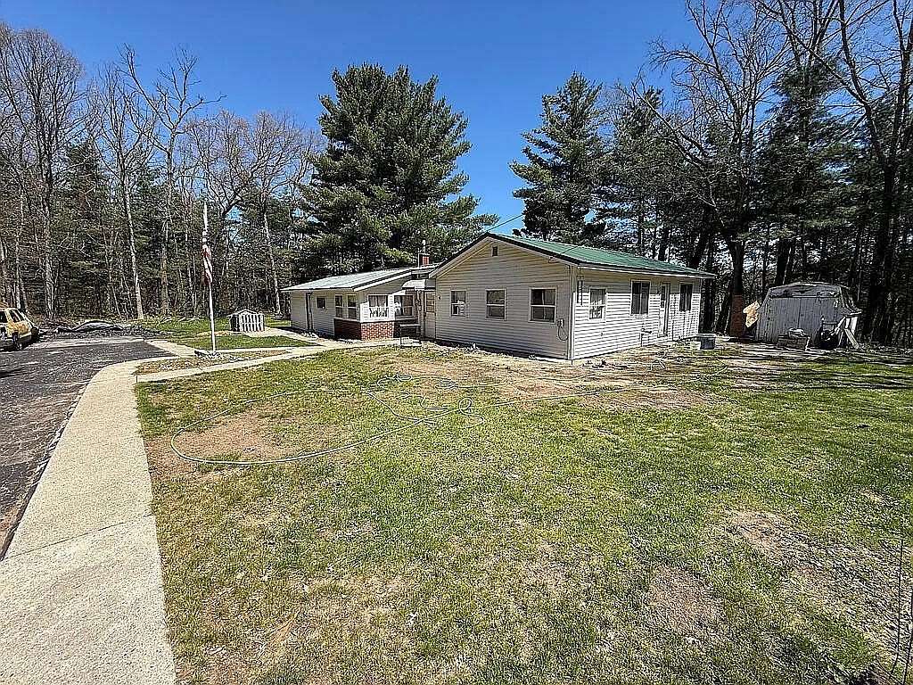 10 Acres of Land with Home for Sale in White Cloud, Michigan