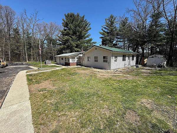 10 Acres of Land with Home for Sale in White Cloud, Michigan