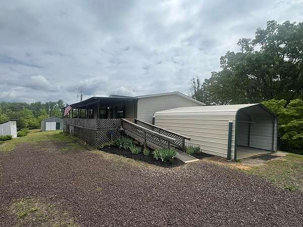 4.9 Acres of Land with Home for Sale in Farner, Tennessee