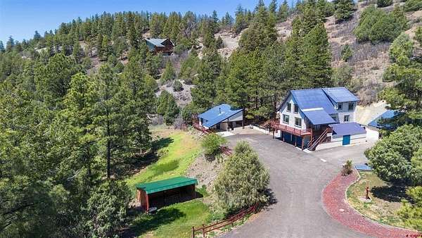 5 Acres of Land with Home for Sale in Pagosa Springs, Colorado