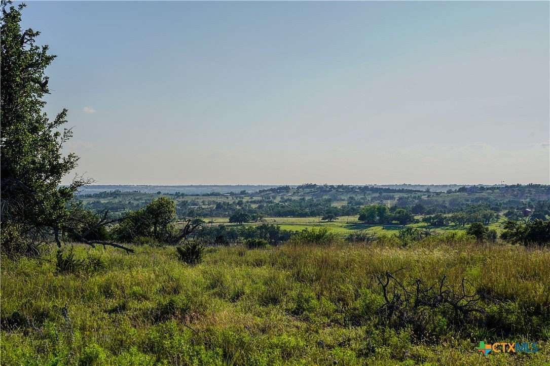 126 Acres of Agricultural Land with Home for Sale in Fredericksburg, Texas