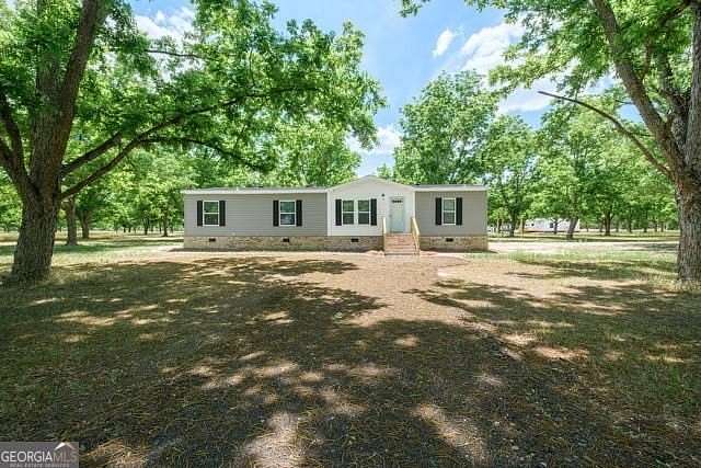 5.5 Acres of Land with Home for Sale in Odum, Georgia