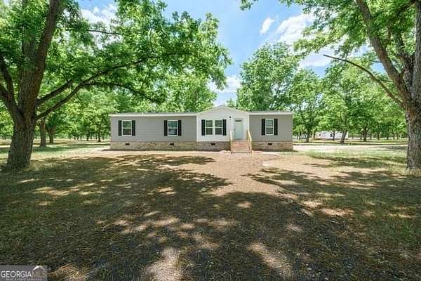 5.5 Acres of Land with Home for Sale in Odum, Georgia