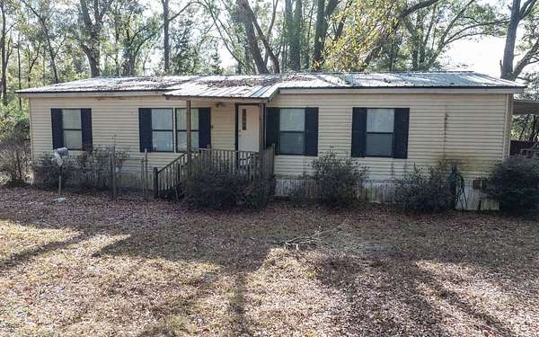 8 Acres of Land with Home for Sale in McAlpin, Florida