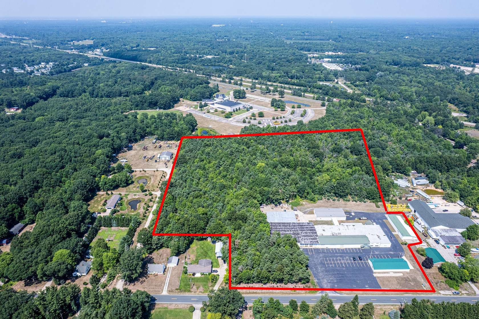 17.4 Acres of Improved Commercial Land for Sale in Fruitport, Michigan