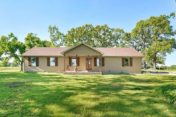 41.2 Acres of Land with Home for Sale in Aurora, Missouri