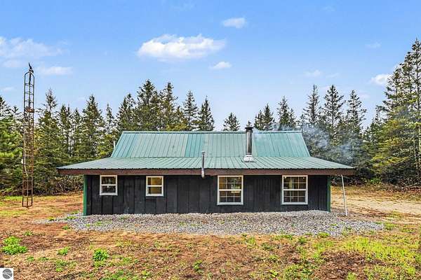 5 Acres of Land with Home for Sale in Cadillac, Michigan