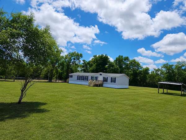 1.5 Acres of Land with Home for Sale in Hosford, Florida