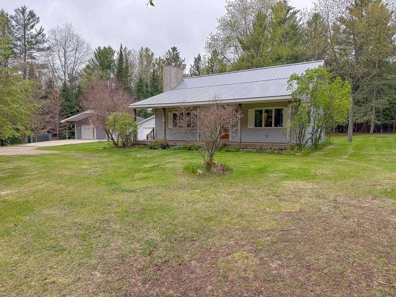60 Acres of Recreational Land with Home for Sale in Harrison, Michigan