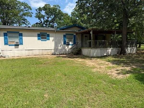 1.5 Acres of Land with Home for Sale in Log Cabin, Texas