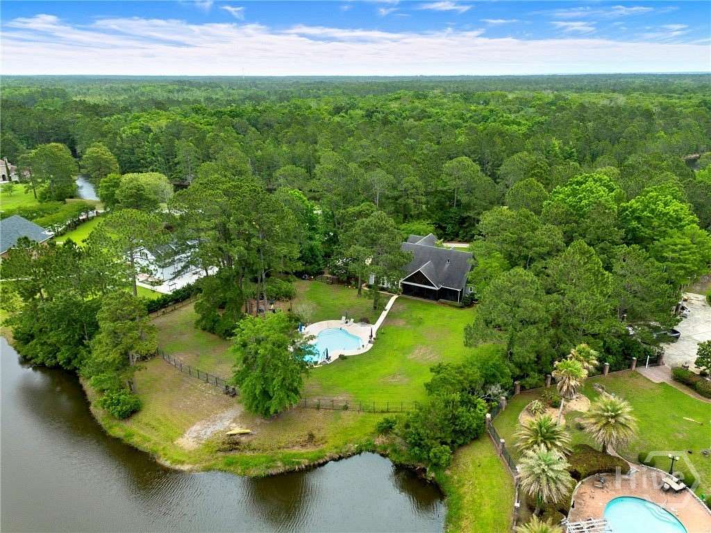 2.5 Acres of Land with Home for Sale in Richmond Hill, Georgia