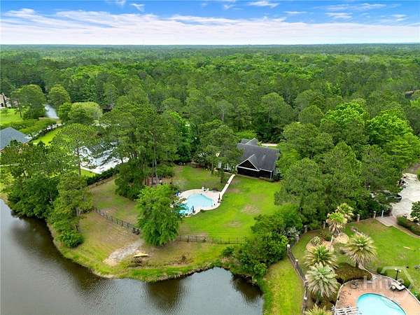 2.5 Acres of Land with Home for Sale in Richmond Hill, Georgia
