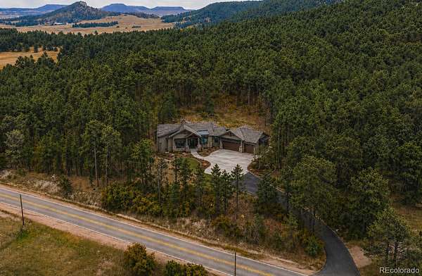 1.8 Acres of Land with Home for Sale in Larkspur, Colorado