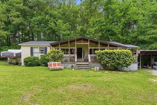 15.6 Acres of Land with Home for Sale in Clinton, South Carolina