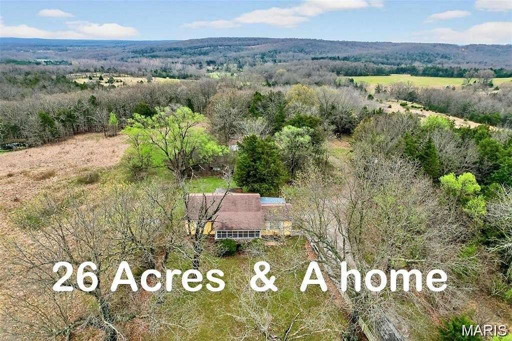 26 Acres of Land with Home for Sale in Richland, Missouri