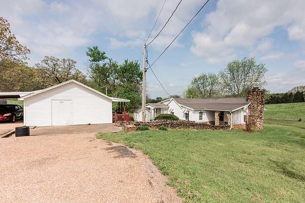 19 Acres of Land with Home for Sale in Pleasant Hope, Missouri