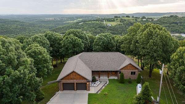 120 Acres of Recreational Land with Home for Sale in Hollister, Missouri