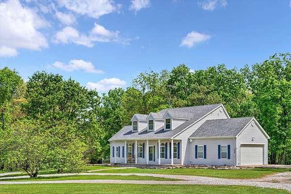 43 Acres of Recreational Land with Home for Sale in Weaubleau, Missouri