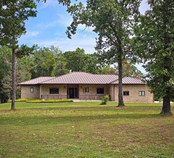 19.2 Acres of Land with Home for Sale in Raymondville, Missouri