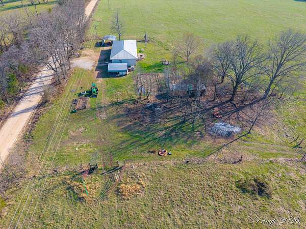 2.57 Acres of Land with Home for Sale in Pottersville, Missouri