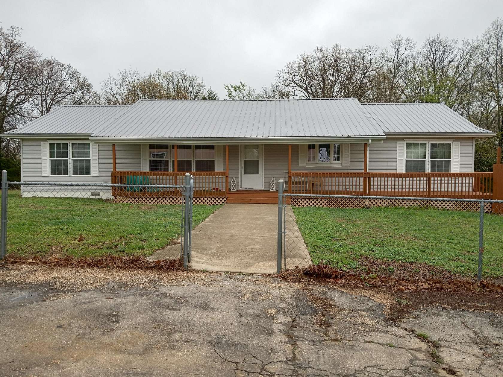 4.4 Acres of Land with Home for Sale in Macks Creek, Missouri