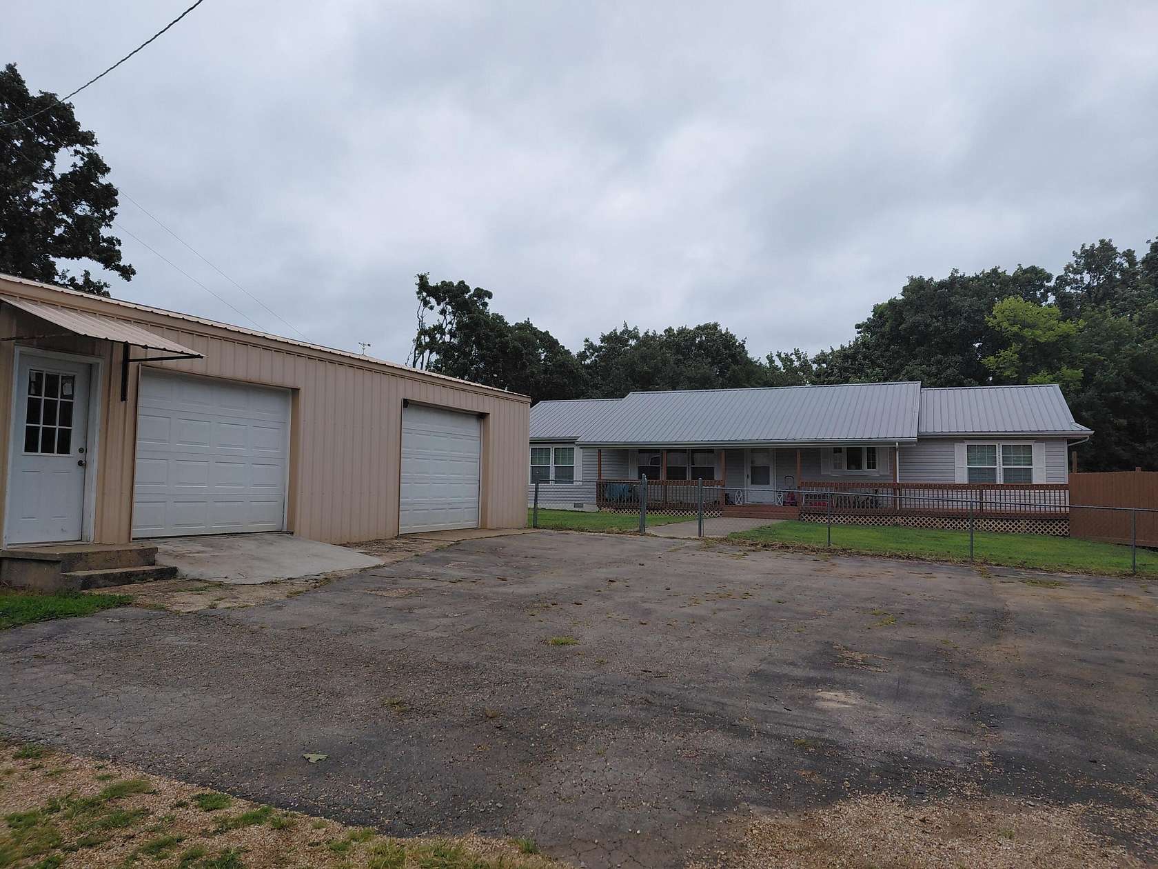 4.4 Acres of Land with Home for Sale in Macks Creek, Missouri