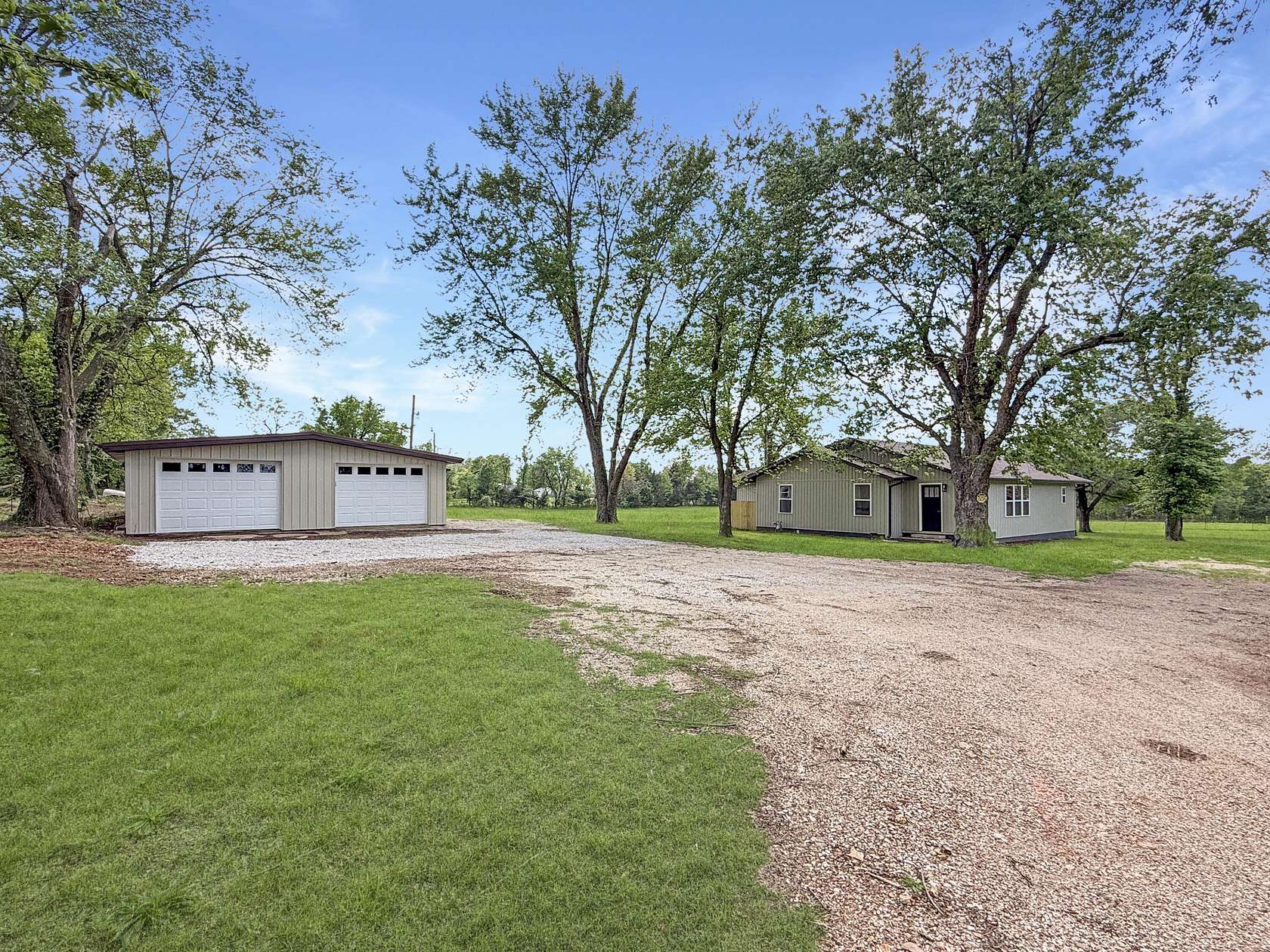 10.9 Acres of Land with Home for Sale in Granby, Missouri