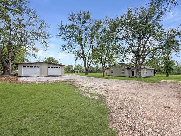 10.9 Acres of Land with Home for Sale in Granby, Missouri